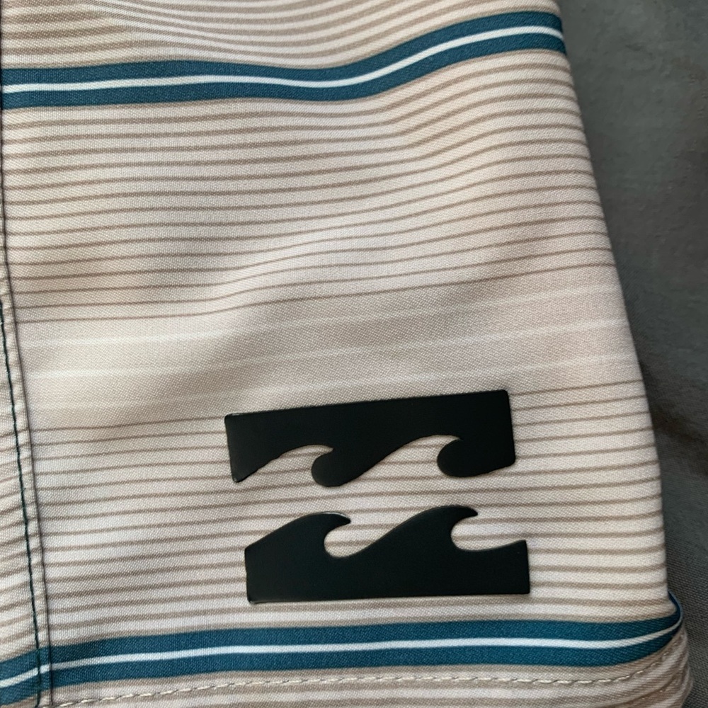 Men’s size 30 billabong board shorts.